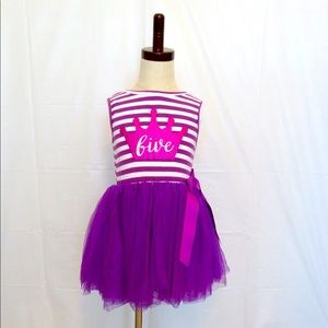 Purple and white striped fifth birthday dress